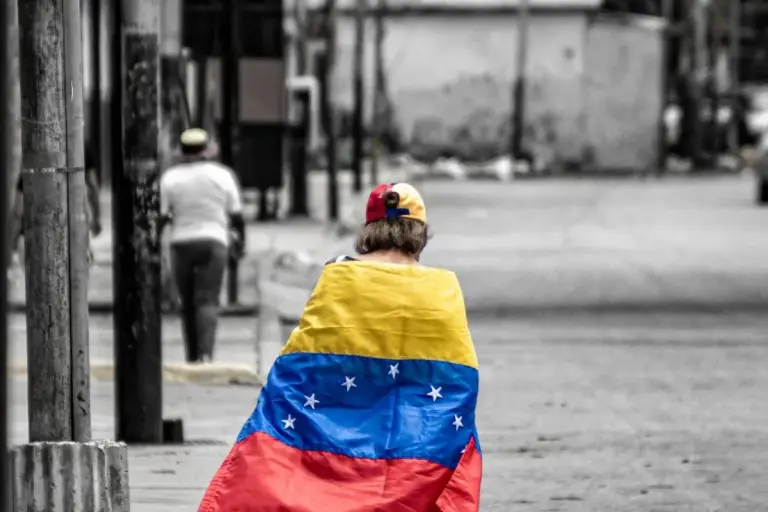 venezuela person walking with flag