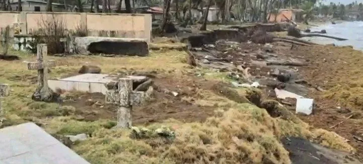graves being taken by ocean in colon province