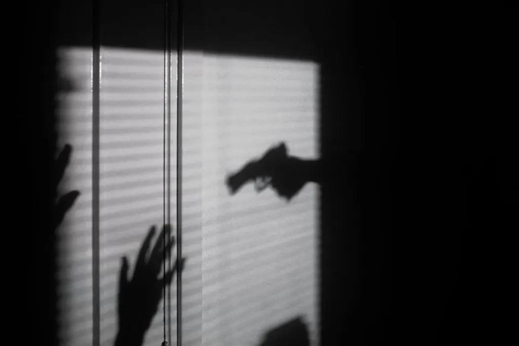 shadow showing gun violence