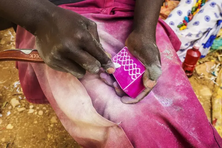 3840px Person hand carving carving soapstone trinket box, Tabaka Hills, Kenya