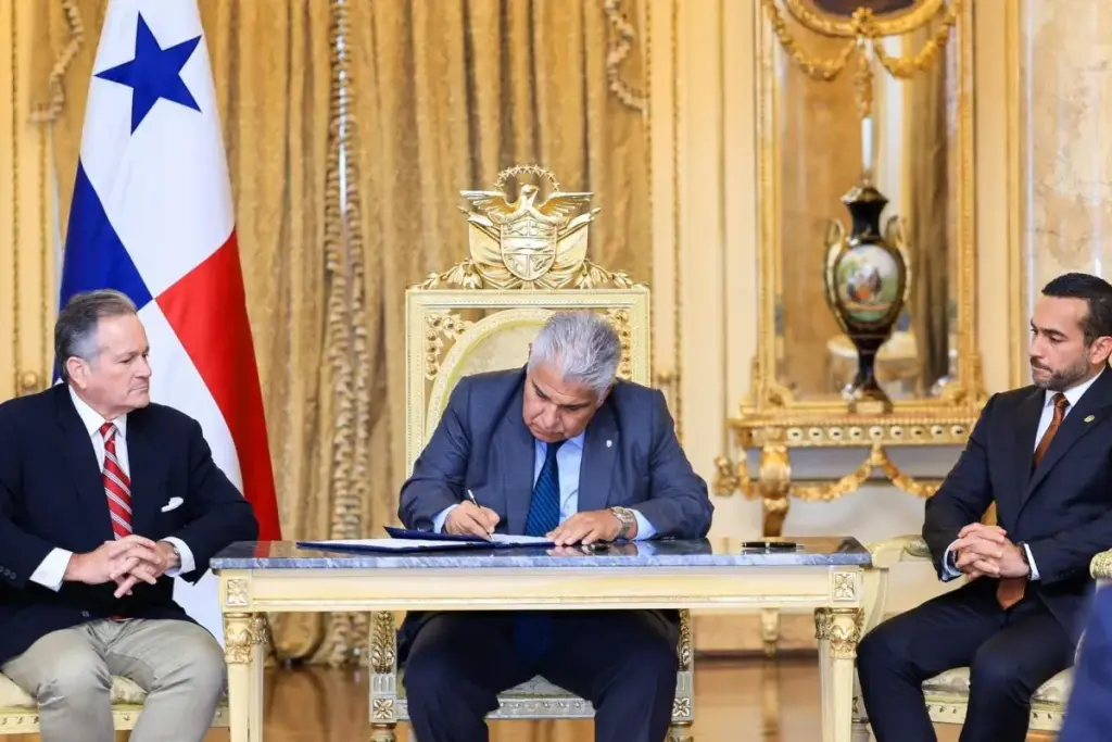 president mulino signing a new law