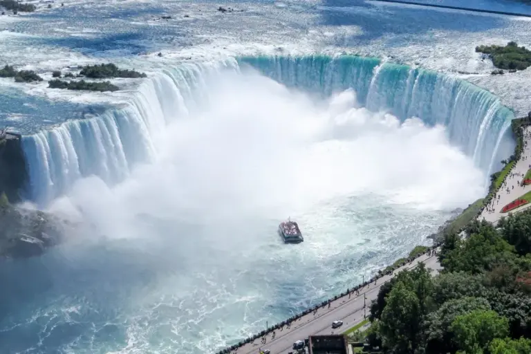 Panama Embassy in Canada Issues Niagara Falls Travel Advisory for Citizens 3840px Aerial view of the Canadian Falls (Horseshoe Falls) and the Hornblower Niagara Cruises boat; Niagara Falls