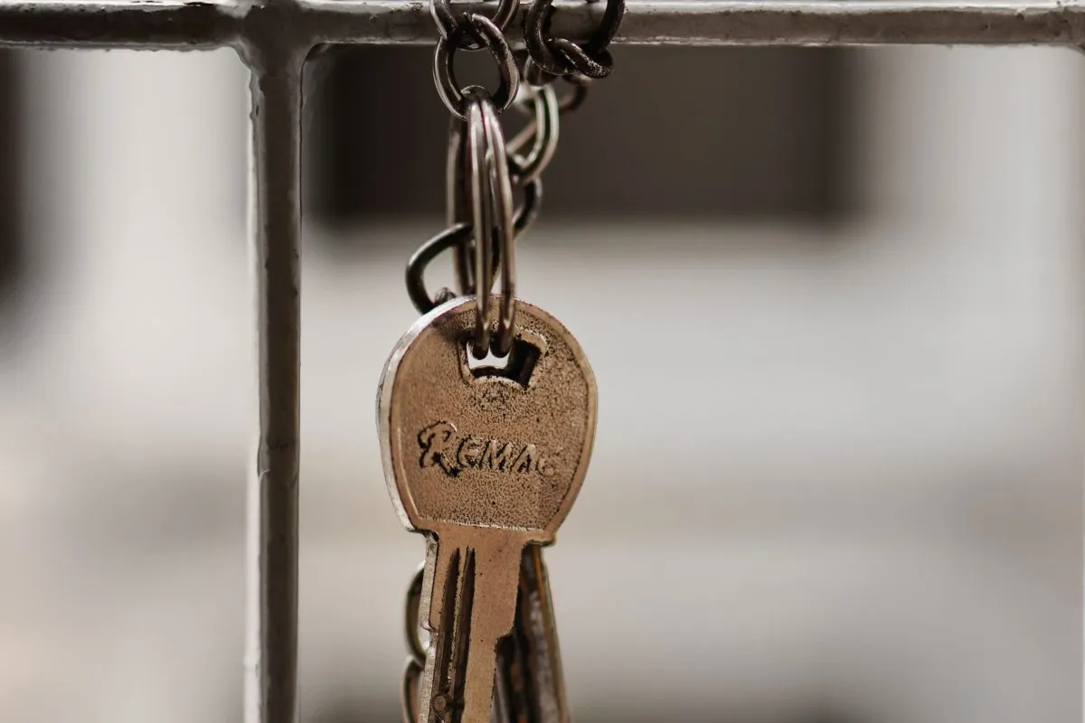 real estate key chained to bars