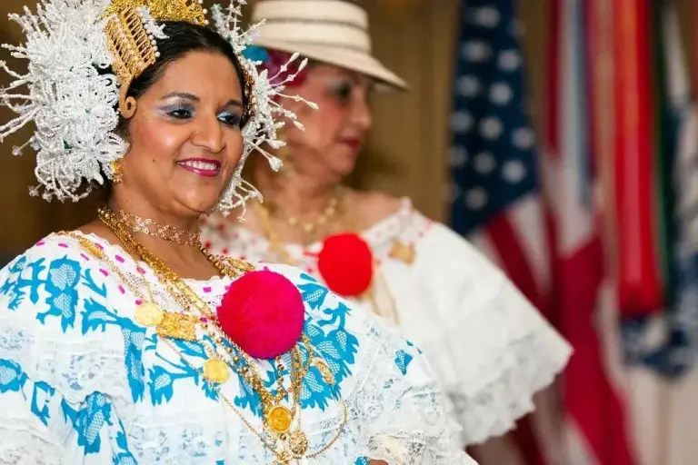a dancer with the estrellas de panama wears a colorful polleras
