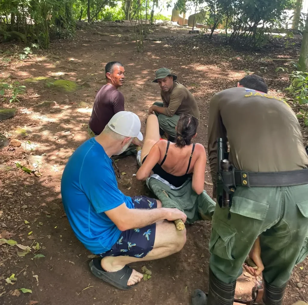Environmental police assist tourist on Iguana Island 2 by policia