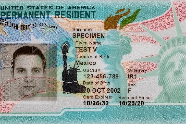 2023 green card front By U.S. Citizenship and Immigration Services (USCIS) - https://citizenpath.com/how-to-read-green-card/, Public Domain, https://commons.wikimedia.org/w/index.php?curid=137651123 US visa suspension
