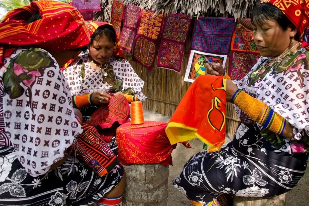 large Guna Women sewing Molas